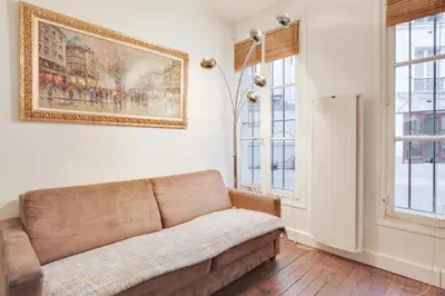 Coin salon dans l'établissement Comfortable flat in the middle of Paris