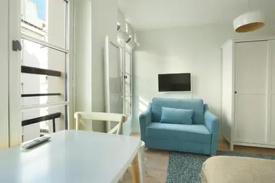 Télévision ou salle de divertissement dans l'établissement Résidence Grands Boulevards by Studio prestige