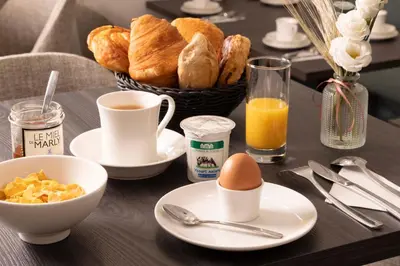 Options de petit-déjeuner proposées aux clients de l'établissement Grand Hôtel Lévêque