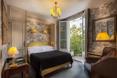 Un ou plusieurs lits dans un hébergement de l'établissement Hôtel Duc De St-Simon