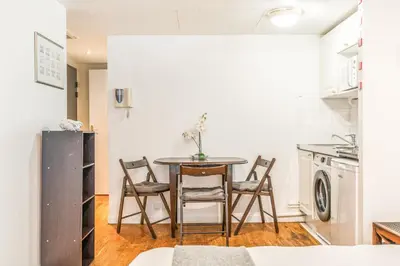 Cuisine ou kitchenette dans l'établissement Champs Elysees Flat