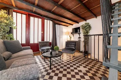 Coin salon dans l'établissement Architect's Triplex - Haut Marais