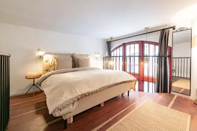 Un ou plusieurs lits dans un hébergement de l'établissement Architect's Triplex - Haut Marais