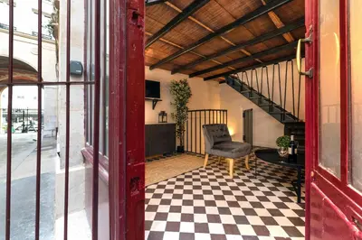 Coin salon dans l'établissement Architect's Triplex - Haut Marais