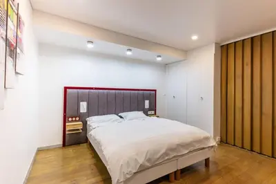 Un ou plusieurs lits dans un hébergement de l'établissement Home in Paris Marais Elegant Flat in Old Paris