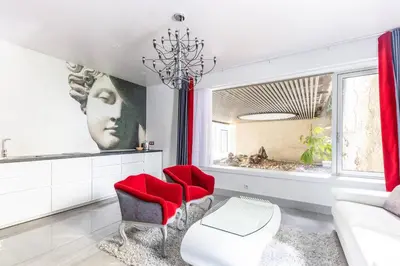 Coin salon dans l'établissement Home in Paris Marais Elegant Flat in Old Paris