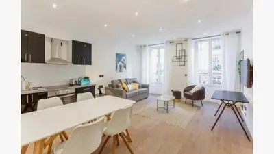 Coin salon dans l'établissement Amazing 2 Bedroom Parisian flat