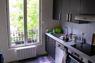 Cuisine ou kitchenette dans l'établissement 25 Rue du Télégraphe