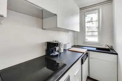 Cuisine ou kitchenette dans l'établissement Design apartment with terrace by Weekome