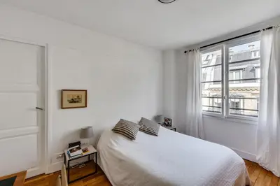 Un ou plusieurs lits dans un hébergement de l'établissement Design apartment with terrace by Weekome