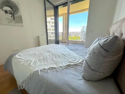 Un ou plusieurs lits dans un hébergement de l'établissement L'appartement Rostro