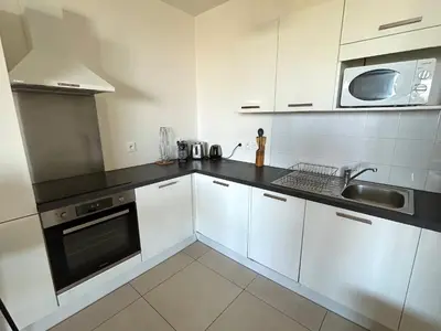 Cuisine ou kitchenette dans l'établissement L'appartement Rostro