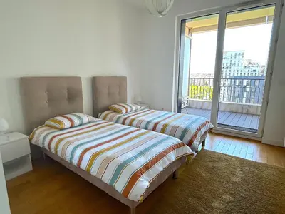 Un ou plusieurs lits dans un hébergement de l'établissement L'appartement Rostro