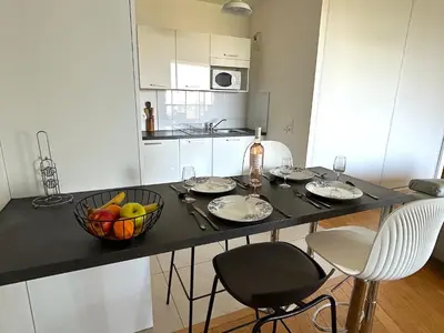 Cuisine ou kitchenette dans l'établissement L'appartement Rostro