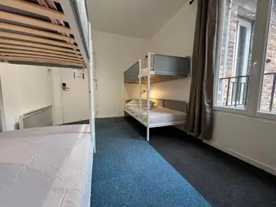 Un ou plusieurs lits dans un hébergement de l'établissement Le Coffice Auberge de Jeunesse