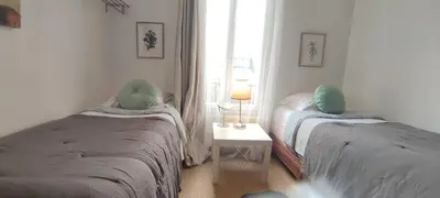 Un ou plusieurs lits dans un hébergement de l'établissement PARIS AUTHENTIC HOUSE Métro Line 14 Station Hôpital Bicêtre, RER B Gentilly