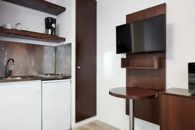 Cuisine ou kitchenette dans l'établissement Aparthotel Adagio Access Paris Bastille