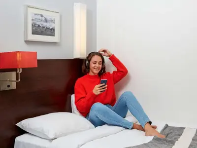 Un ou plusieurs lits dans un hébergement de l'établissement Aparthotel Adagio Access Paris Bastille