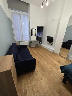 Télévision ou salle de divertissement dans l'établissement Studio Aboukir 1