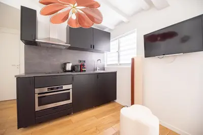 Cuisine ou kitchenette dans l'établissement Dreamyflat - Archives