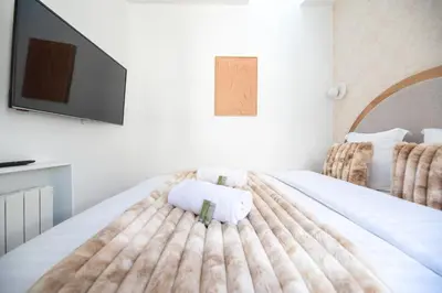 Un ou plusieurs lits dans un hébergement de l'établissement Dreamyflat - Archives
