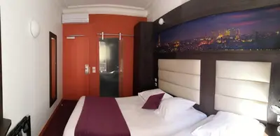Un ou plusieurs lits dans un hébergement de l'établissement Parc Hotel