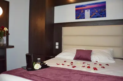 Un ou plusieurs lits dans un hébergement de l'établissement Parc Hotel