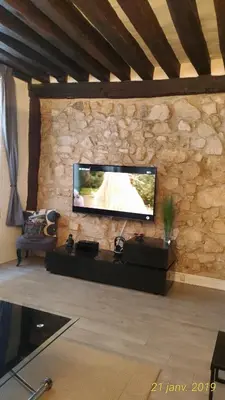 Télévision ou salle de divertissement dans l'établissement Appartement St Martin