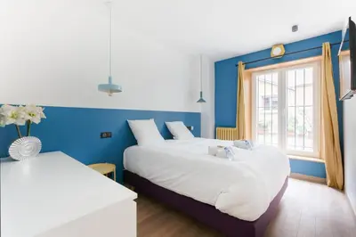 Un ou plusieurs lits dans un hébergement de l'établissement Spacious apartment - 2B-10P - AC - Marais