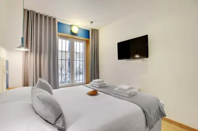 Un ou plusieurs lits dans un hébergement de l'établissement Spacious apartment - 2B-10P - AC - Marais