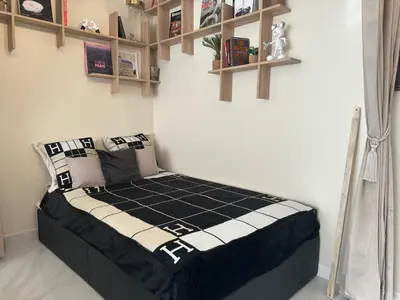 Un ou plusieurs lits dans un hébergement de l'établissement ARC DE TRIOMPHE-CARNOT Luxury & Design