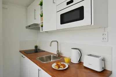 Cuisine ou kitchenette dans l'établissement SAINT PAUL 22