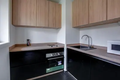 Cuisine ou kitchenette dans l'établissement BEAUTY SAINT PAUL renovated February 2026