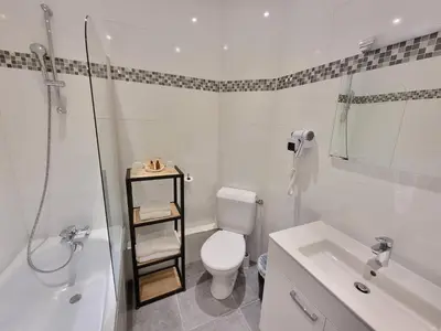 Salle de bains dans l'établissement Hôtel Océanic - Grands Magasins
