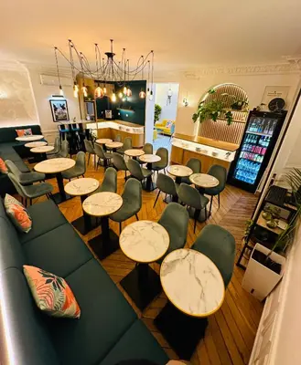 Coin salon dans l'établissement Hôtel Océanic - Grands Magasins