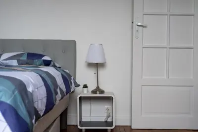 Un ou plusieurs lits dans un hébergement de l'établissement Charmant 2 pièces pour 4 personnes à Courbevoie