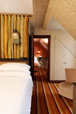 Un ou plusieurs lits dans un hébergement de l'établissement Hôtel Bourg Tibourg - Paris Marais