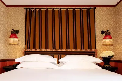 Un ou plusieurs lits dans un hébergement de l'établissement Hôtel Bourg Tibourg - Paris Marais