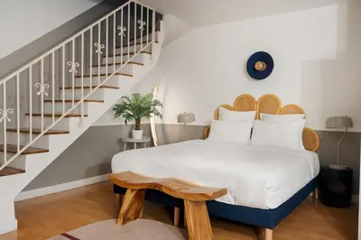 Un ou plusieurs lits dans un hébergement de l'établissement Edgar Suites Saint-Augustin - Naples