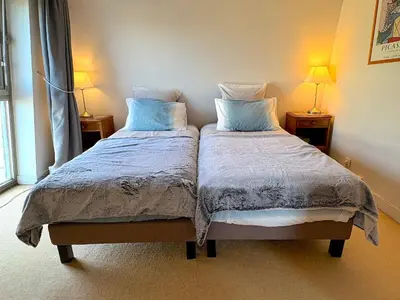 Un ou plusieurs lits dans un hébergement de l'établissement Le Penthouse Thorigny