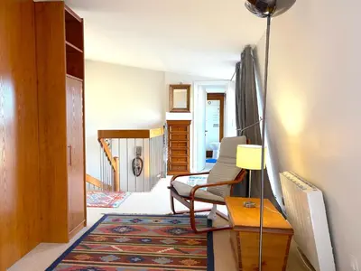 Coin salon dans l'établissement Le Penthouse Thorigny