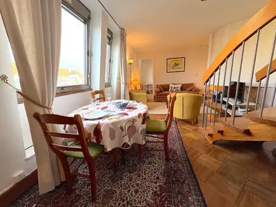 Coin salon dans l'établissement Le Penthouse Thorigny