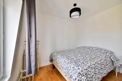 Un ou plusieurs lits dans un hébergement de l'établissement Belle vue 2