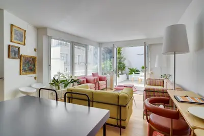 Coin salon dans l'établissement Bastille Apt design with AC terrace 5 people by Weekome