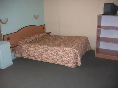 Un ou plusieurs lits dans un hébergement de l'établissement Hotel Ferney République