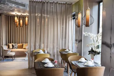 Coin salon dans l'établissement Hôtel Eiffel Segur