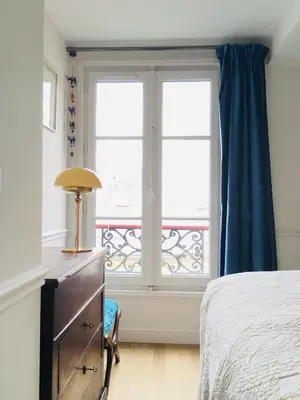 Un ou plusieurs lits dans un hébergement de l'établissement Elegant and cosy flat near Montmartre