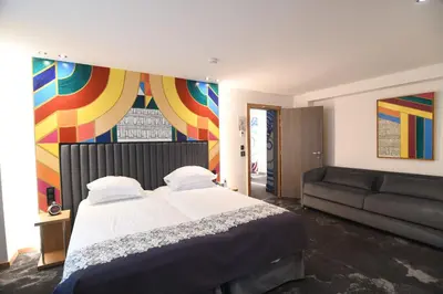 Un ou plusieurs lits dans un hébergement de l'établissement Hotel Aida Opera
