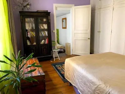 Un ou plusieurs lits dans un hébergement de l'établissement L'appartement Boulnois