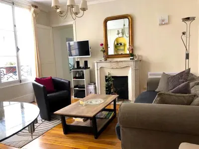 Coin salon dans l'établissement L'appartement Boulnois